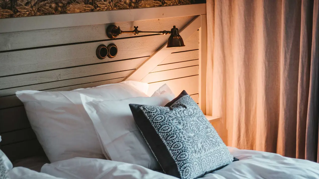 A bright, comfortable bedroom at The Derby Arms