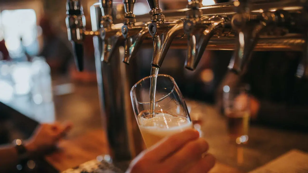 Pouring a pint at the bar